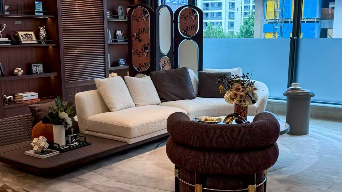 Luxury villa living room with custom sofa, lounge chair and wood storage