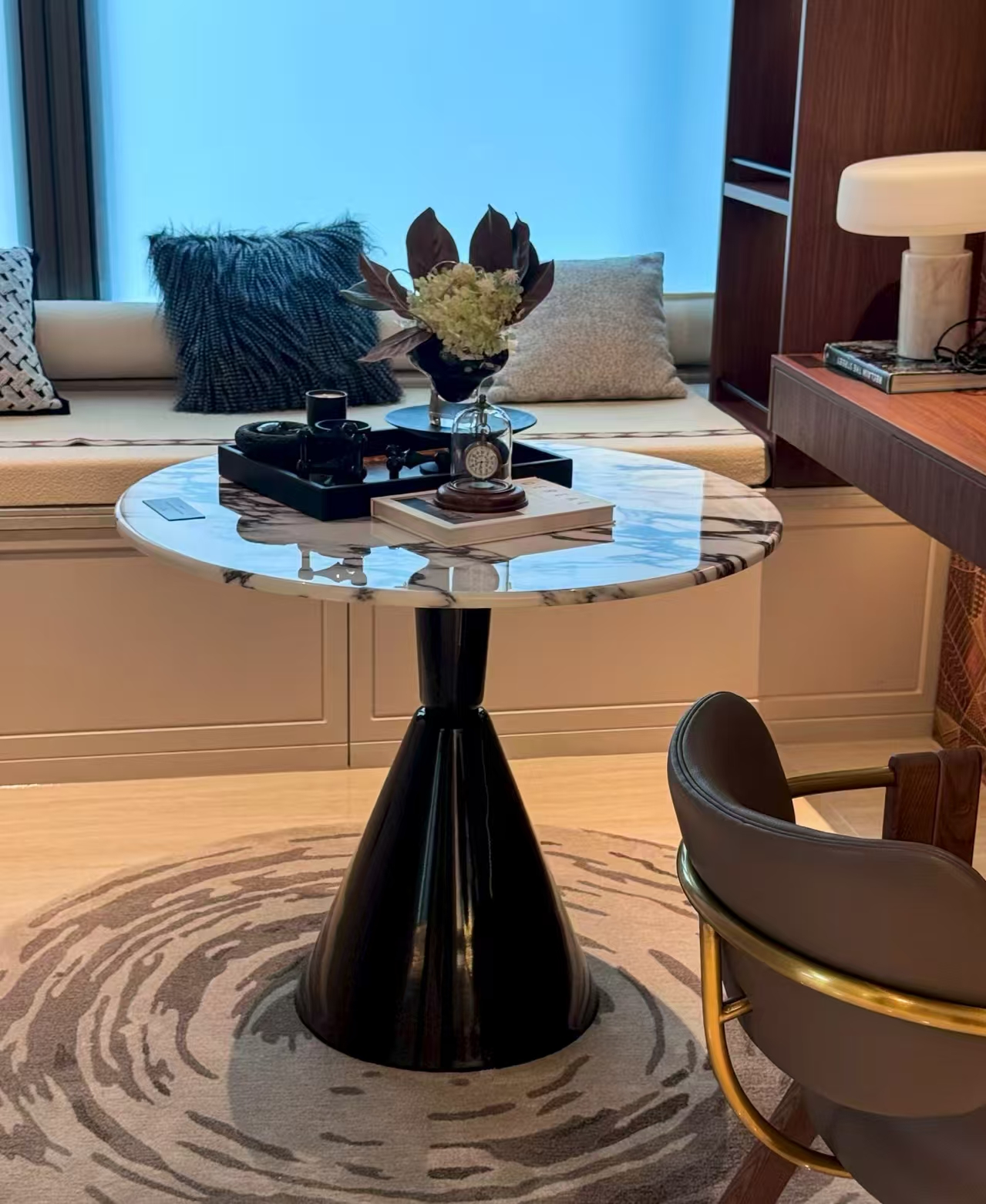 custom marble side table and lounge chair detail