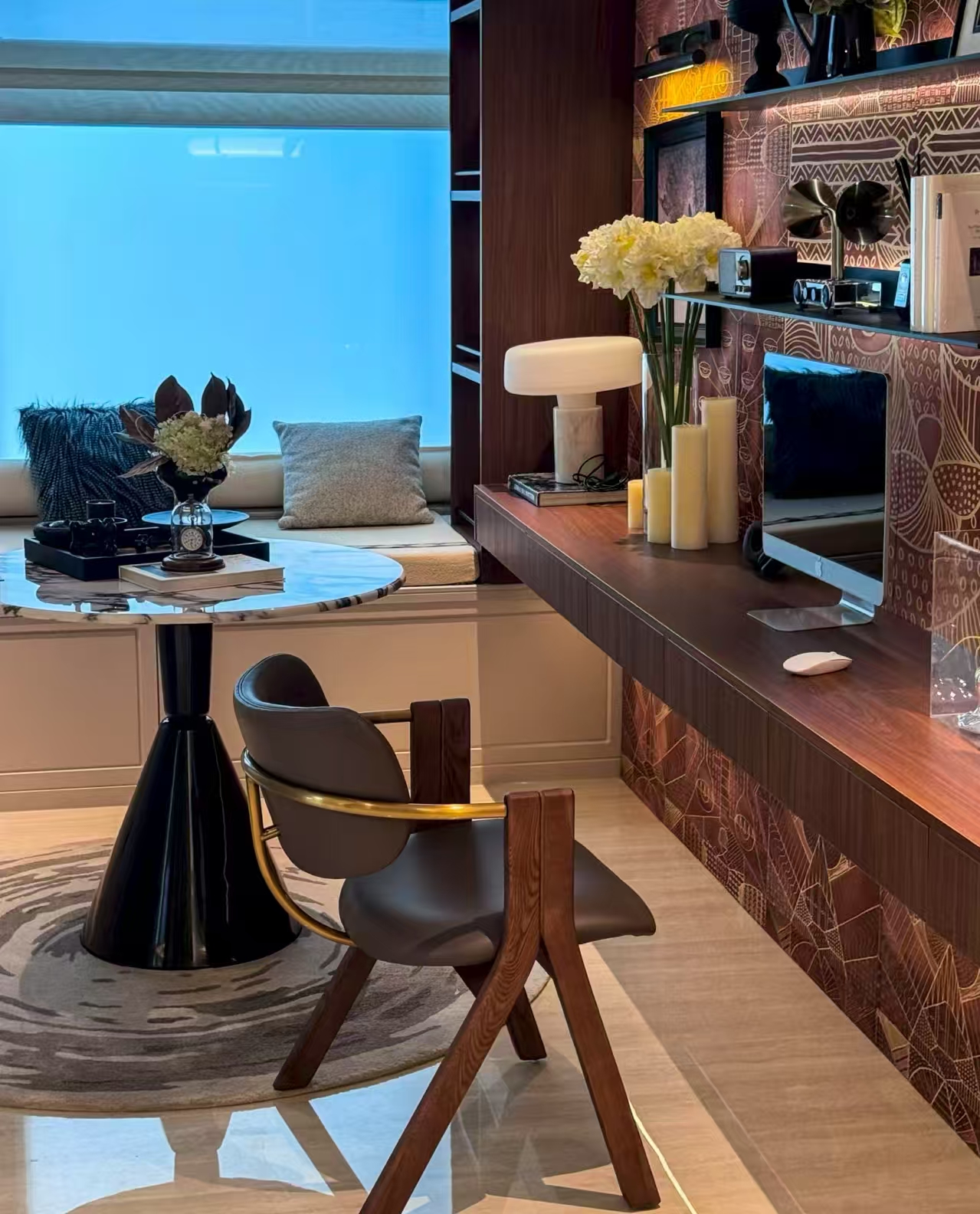 custom study corner with marble table and wood paneling