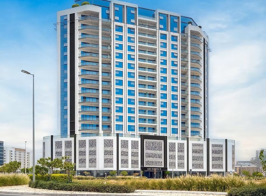 Exterior view of OST Tower 11 residential building in Dubai Majan