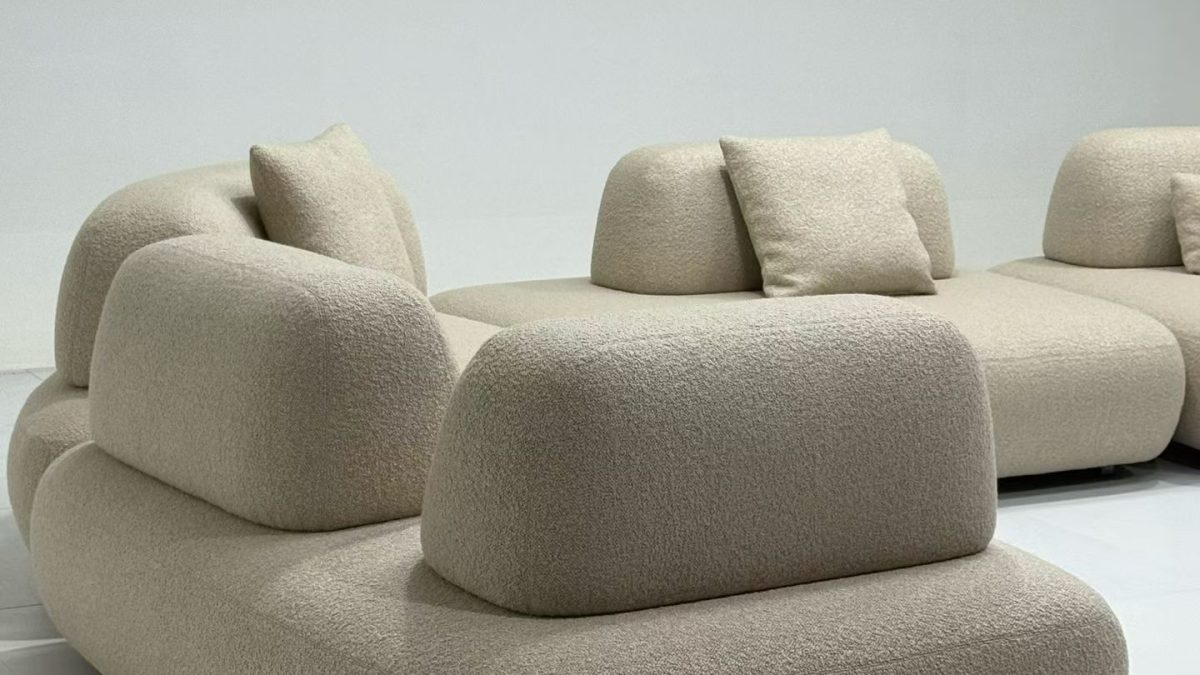 Custom boucle armchair and modular sofa collection for high-end interiors