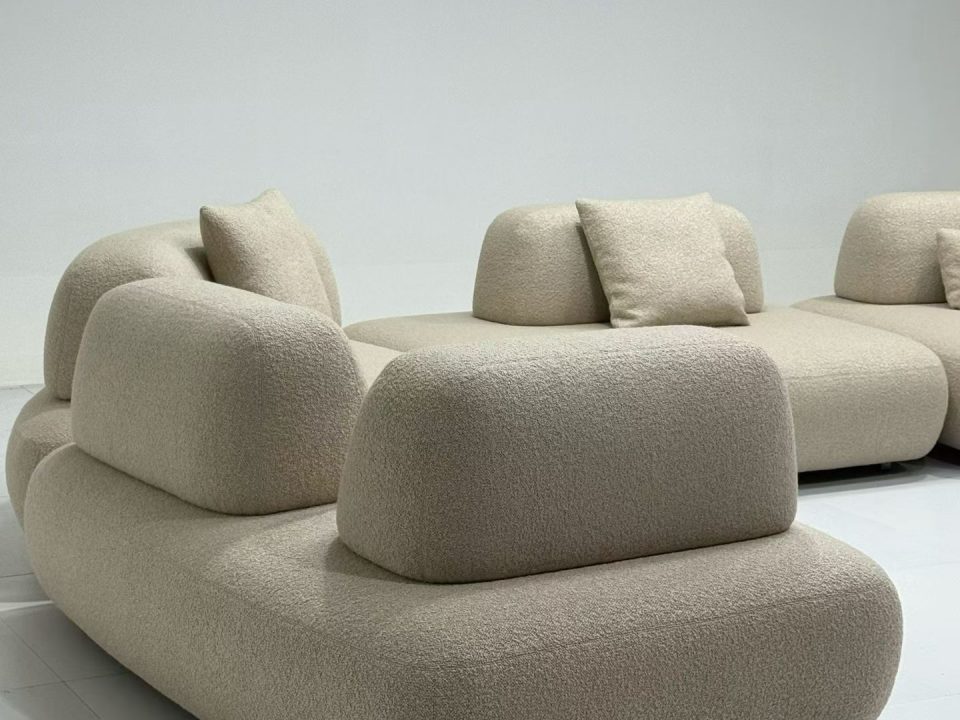 Custom boucle armchair and modular sofa collection for high-end interiors